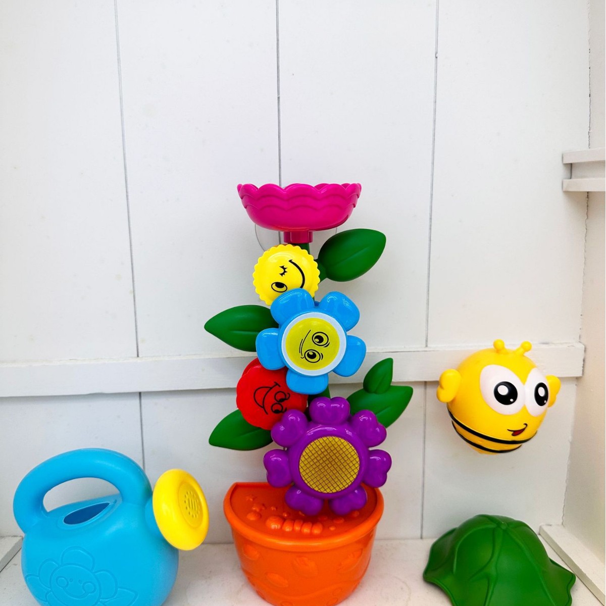 Divertidos juguetes de baño para niños transfronterizos, pequeño juguete giratorio de baño de jardinería, juguete para ducha de bebé, venta directa de fábrica.