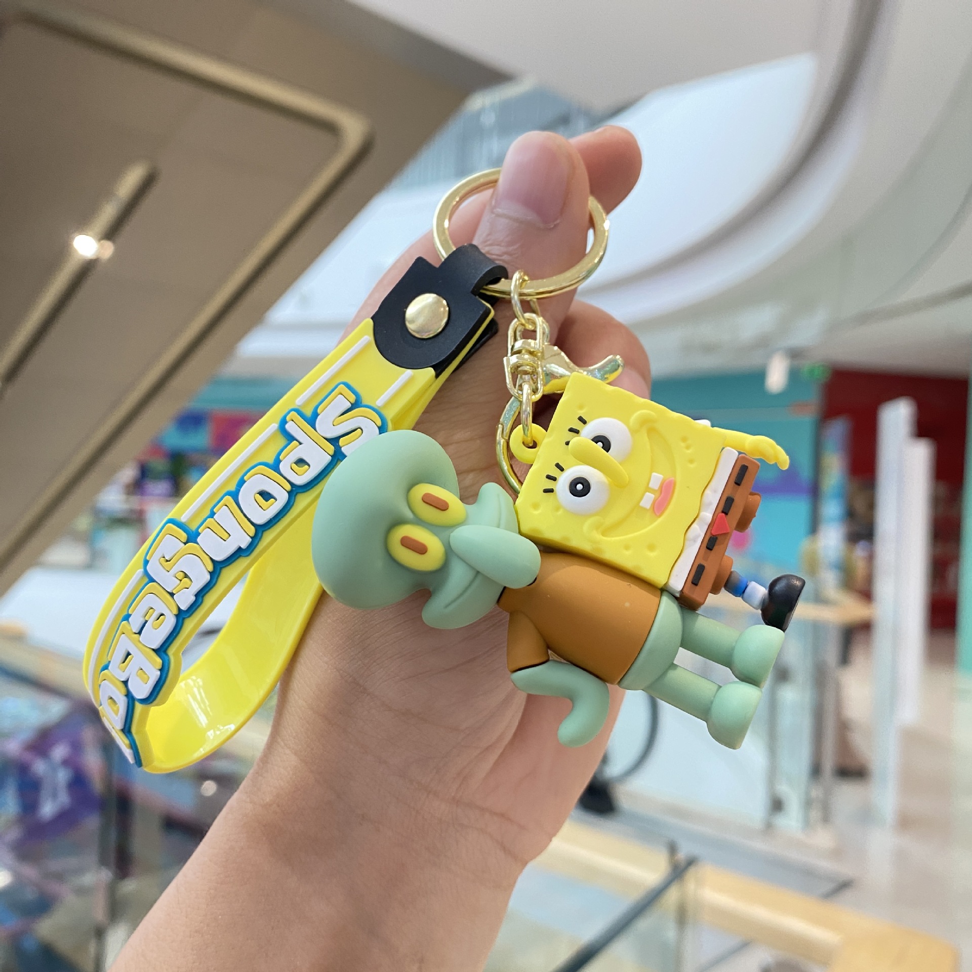 Esponja de dibujos animados bebé llavero lindo Paida estrella muñeca colgante par bolsa apertura temporada coche pequeño regalo