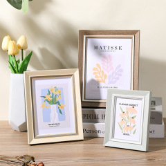 北歐創意相框擺台廠家批發5寸6寸7寸8寸A4兒童影樓畫框掛牆照片牆