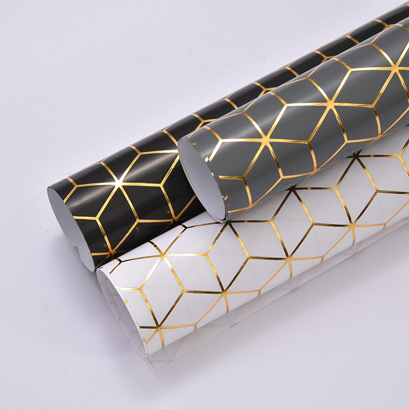 Nuevo papel de regalo de rejilla al por mayor diseño creativo caja de regalo de vacaciones papel de embalaje papel de regalo de oro