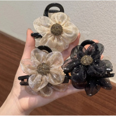 高級感のある網の糸の水のドリルの太陽の花は女性の気質をつかんで半分に髪の花を刺して髪を挟みます。