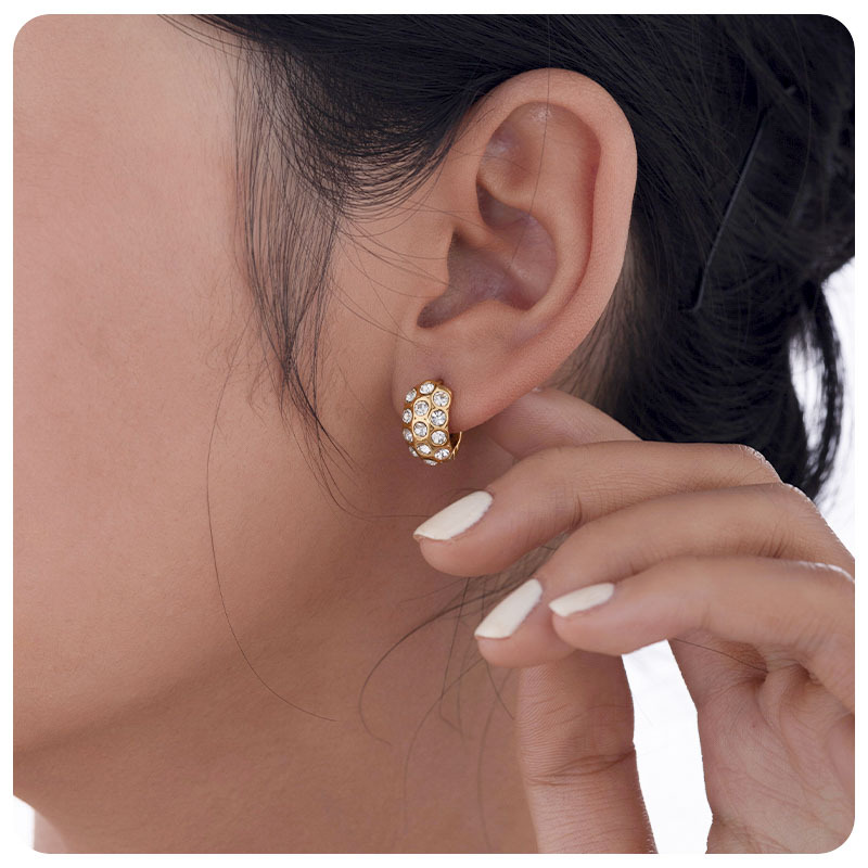 Taina Europa y los Estados Unidos 18k oro real galvanizado auriculares de acero de titanio moda inns orejetas de zircon pernos de acero inoxidable al por mayor transfronterizos