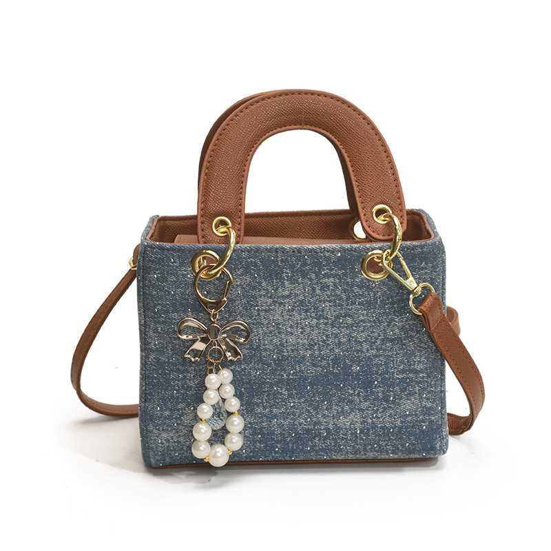 Diseño de nicho color en contraste bolso cuadrado pequeño portátil femenino 2025 nuevo bolso diagonal de diamantes retro de alta gama de moda