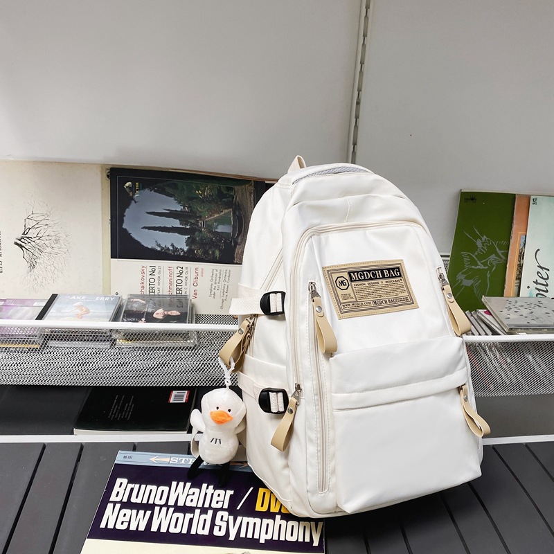Nueva mochila femenina estudiante universitario estudiante de secundaria estudiante de escuela secundaria estudiante chica mochila simple gran capacidad niños mochila al por mayor