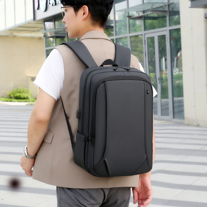 Large-capacity backpack men's new USB charging casual student school bag business commuting simple computer backpack_voghion.com