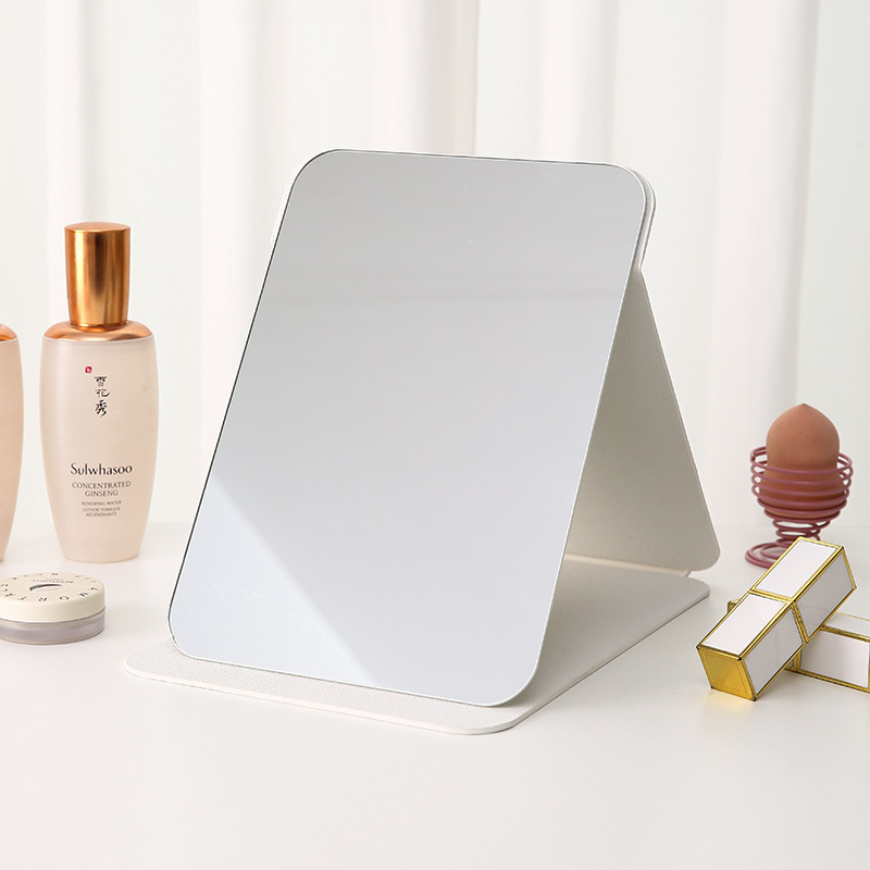 Espejo plegable de cuero PU Dormitorio de estudiantes Espejo de maquillaje de belleza de estilo princesa Espejo de tocador simple de escritorio para el hogar