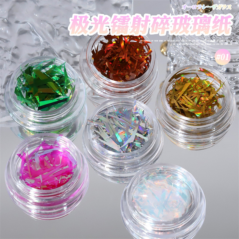 Arte de uñas Aurora duende fragmentos celofán irregular láser japonés Internet celebridad pegatinas Corte libre de uñas al por mayor