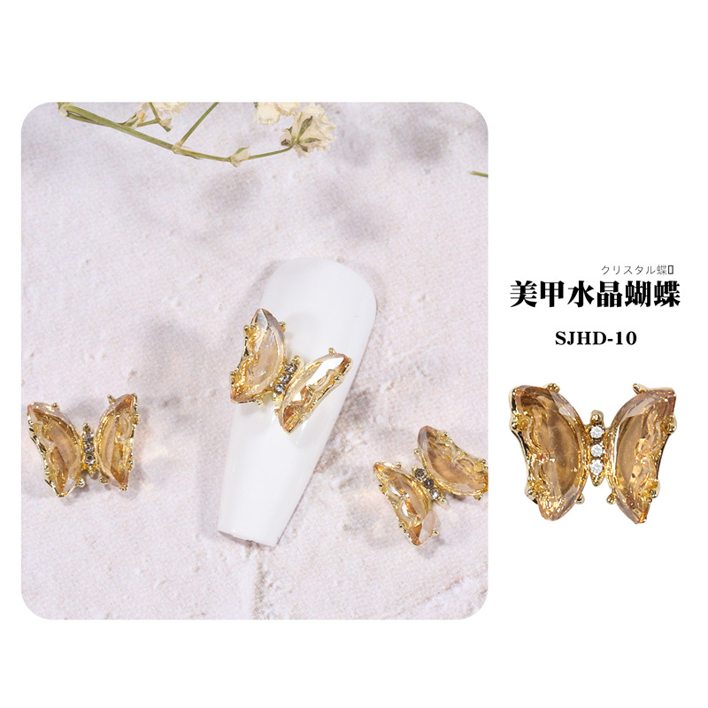 2021 nueva celebridad en línea belleza de uñas mariposa de cristal mágico estilo INS hielo tridimensional transparente Aurora diamante metal decoración de uñas