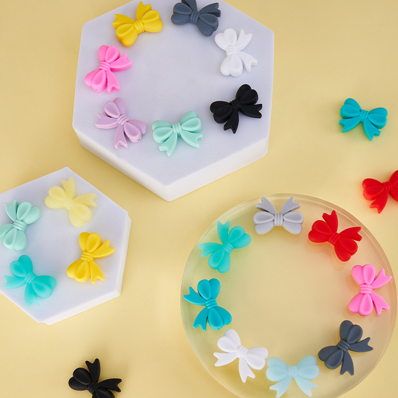 Mariposa de silicona DIY accesorios de la joyería de color perforado arco cuentas bebé teether perlas sueltas cuentas de silicona