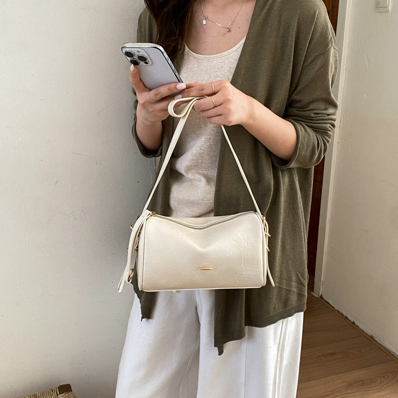 2026 nuevo bolso de brazo simple de color sólido bolso de almohada de viaje de moda moda diaria bolso de hombro