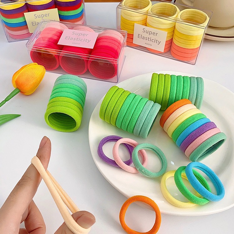 Accesorios para el cabello banda para el cabello al por mayor en caja de alta elástica negro banda de goma sin costura lazo del pelo cuerda de pelo durable cuerda de pelo de cola de caballo