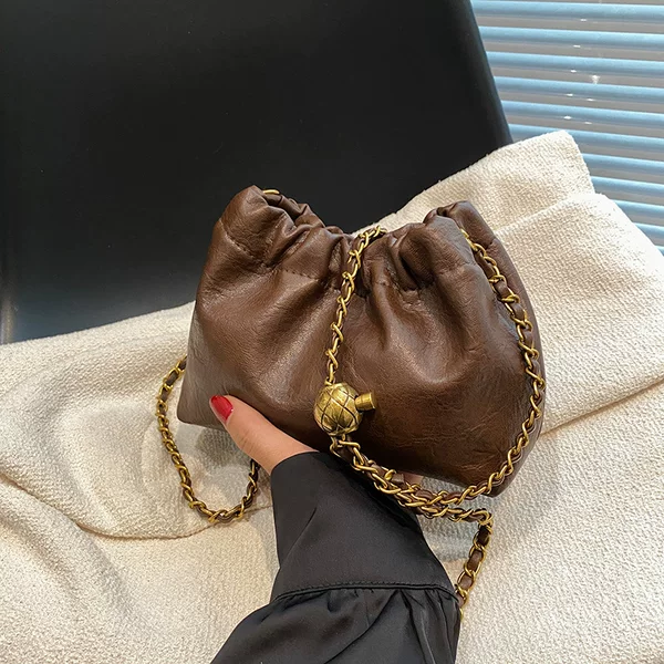 High-End 2026 Autumn and Winter Retro Gold Ball Trash Bag Parent-Child Style Children's Crossbody Accessory Phone Bag Wholesale