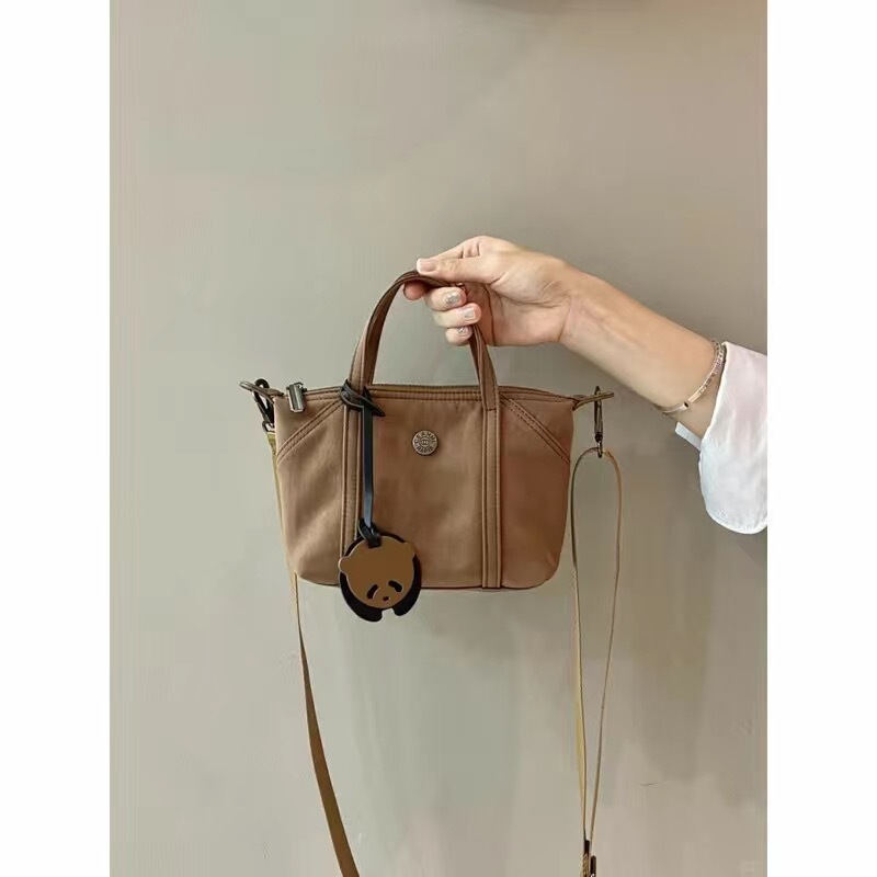 HB 2025 新しいバッグ餃子バッグ女性のショルダーハンドヘルドクロスボディバッグファッショナブルな防水携帯電話バッグ多用途|undefined
