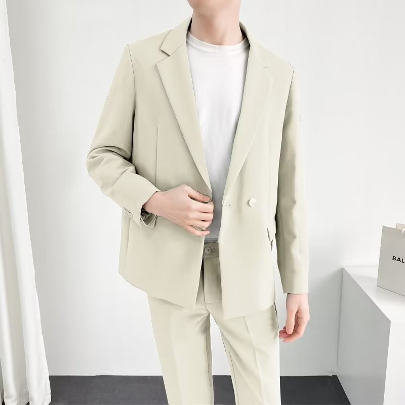 スーツのスーツの男性の韓国版の修身のごろつきはかっこいいです。