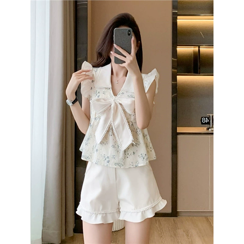 Летний комплект для женщин 2024 года в стиле лесной феи: свежий и милый топ с бантом + шорты, два предмета
