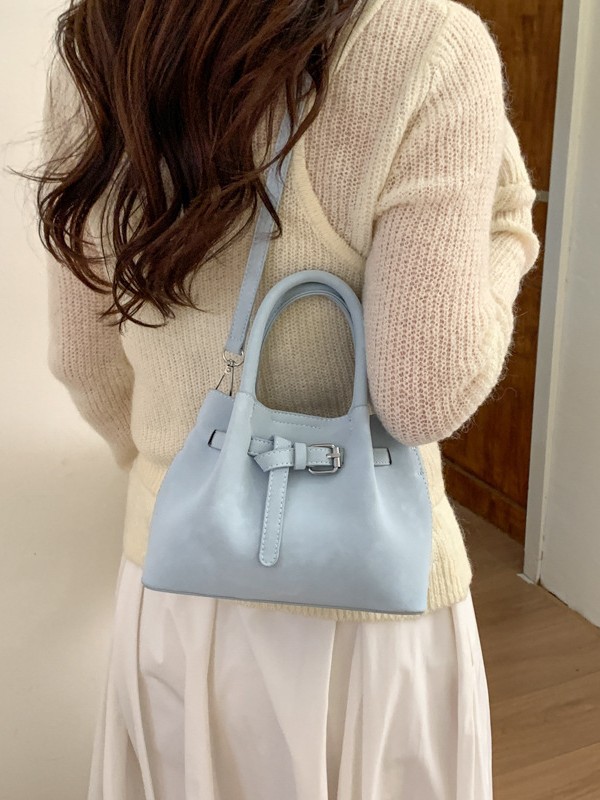 Diseño de nicho simple bolso de cubo portátil para mujeres 2026 nuevo estilo coreano de textura de alta calidad casual versátil bolso de tramo inclinado