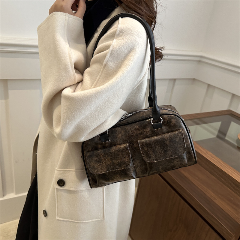 Bolsos para axilas de gran capacidad para viajeros otoño e invierno nueva moda retro nicho bolso de hombro casual de varios bolsillos