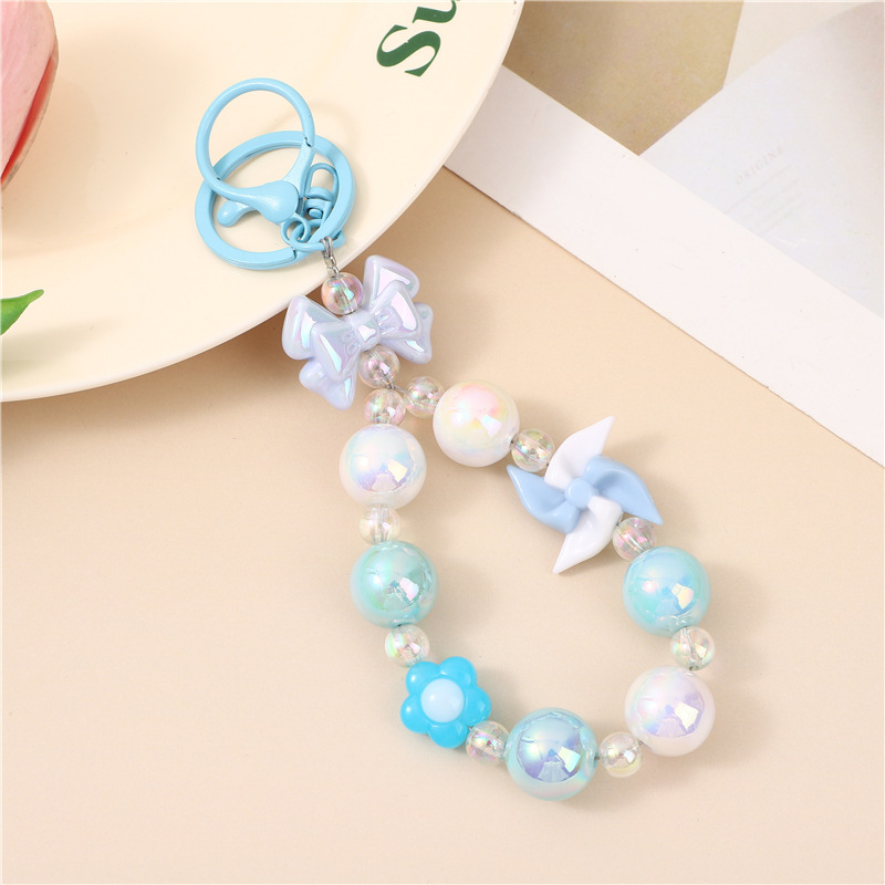 Japón y Corea del Sur color ins hecho a mano con cuentas flor llavero cordón de muñeca macaron color pétalo cordón de teléfono móvil en stock