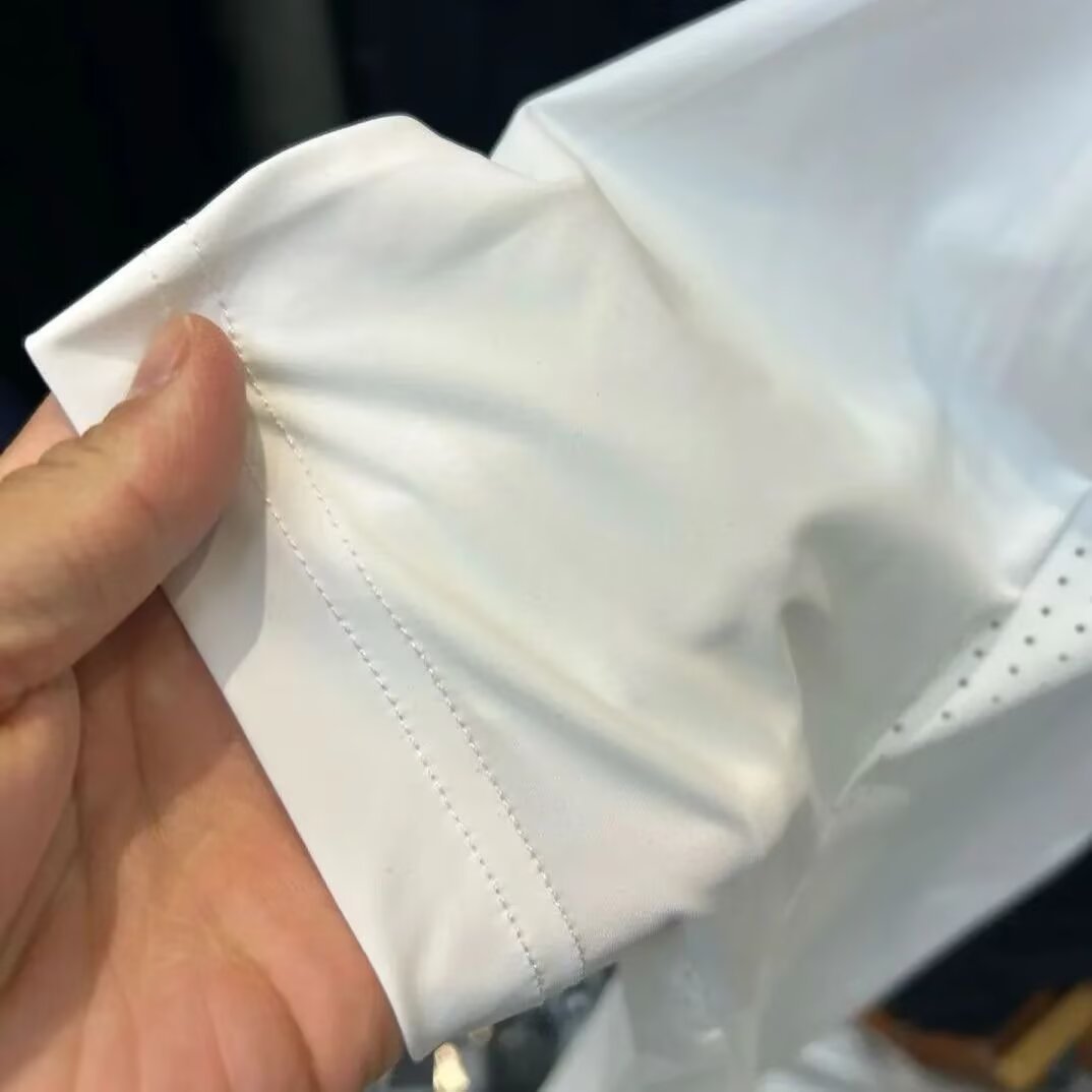 T-shirt de manga corta marca de moda masculina de verano suelta manga de cinco puntos 2026 nueva tendencia en línea in simple impresión superior