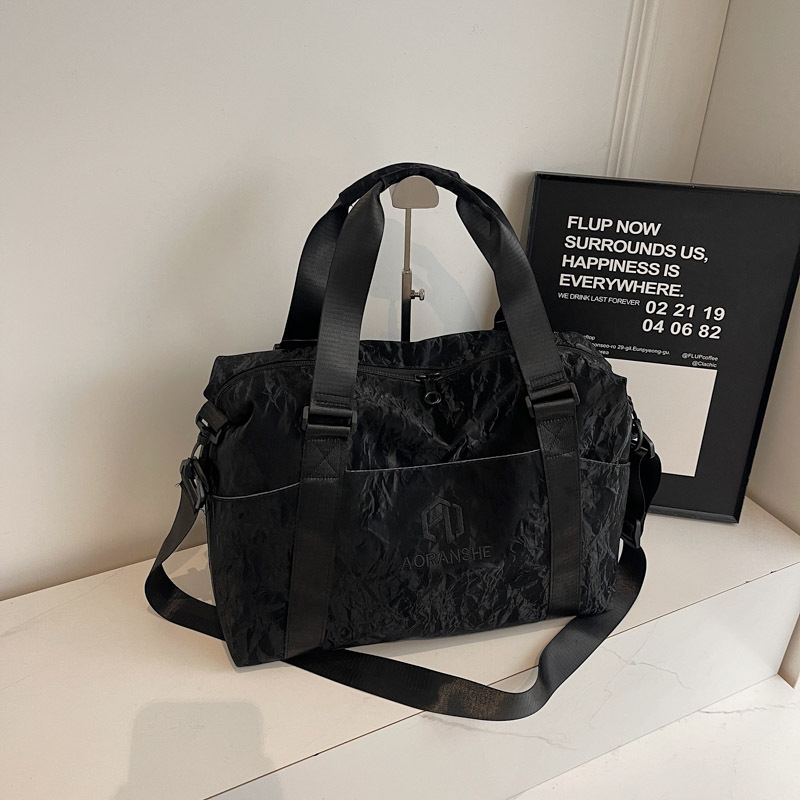 2025 nueva gran capacidad simple bolsas de viaje de mano bolsas deportivas de ocio bolsas de acondicionamiento de la ropa ligeras bolsas inclinadas para mujeres