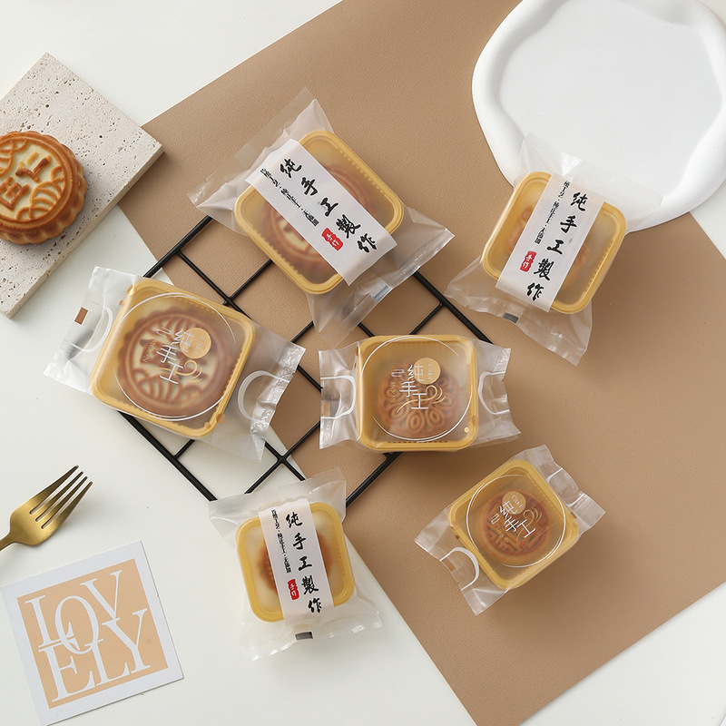 新しい純粋な手作りの月餅の包装袋中秋の食品の包装袋の卵黄のショートニングの食品機の袋を密封して卸売りします。|undefined