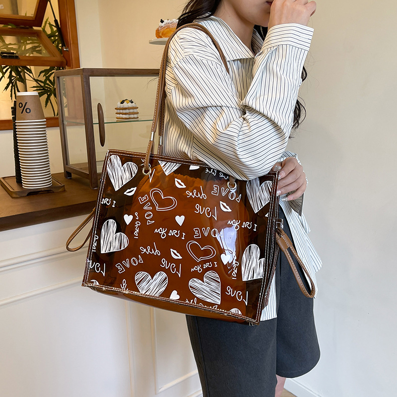 Bolso de nicho transfronterizo 2025 nuevo bolso de niño y mujer bolso de gelatina transparente bolso de hombro de gran capacidad de amor