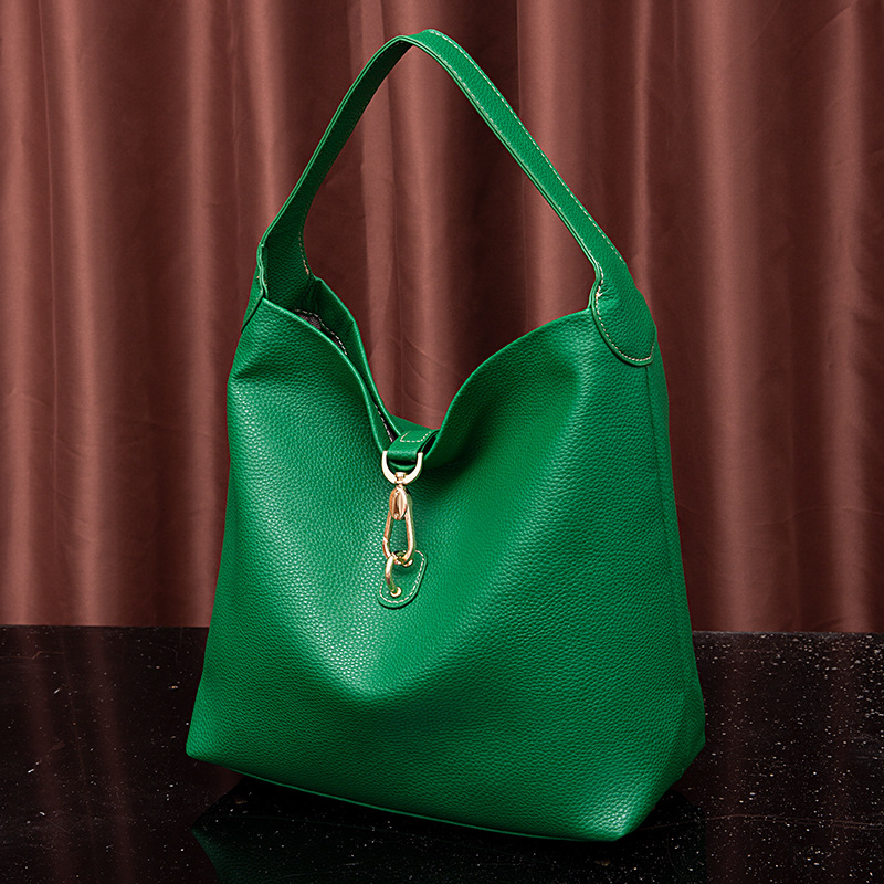 Neue handgehaltene Damen-Tasche mit körnigem Kieselmuster und einer Schulter unter dem Arm_voghion.com