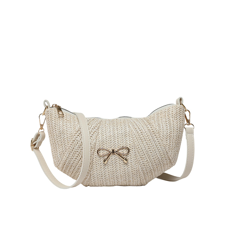 Bolsos tejidos de diseño de nicho para mujer 2025 verano nueva textura comercio exterior casual moda un hombro axila bolsa de bola de masa