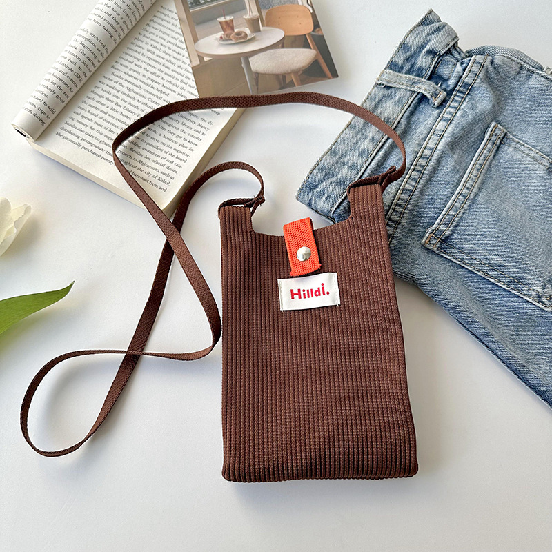 Primavera nuevo color sólido de punto de hombro mochila bolso móvil de moda versátil bolso de dopamina para hombres y mujeres