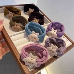 熊のマックスマスクの輪は跡がなくて、馬の尾の紐は髪の毛を刺します。