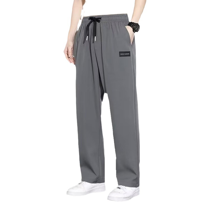 Fábrica al por mayor pantalones atados al tobillo de primavera y verano pantalones deportivos casuales recortados de los hombres de seda fina de hielo pantalones largos de moda