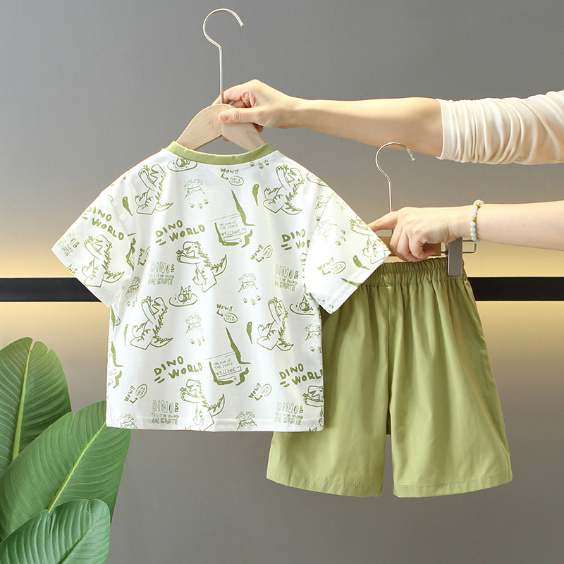 7277 Traje de verano para niños 2025 nuevo estilo estilo occidental dibujos animados para niños dinosaurio de manga corta bebé verano delgado dos piezas