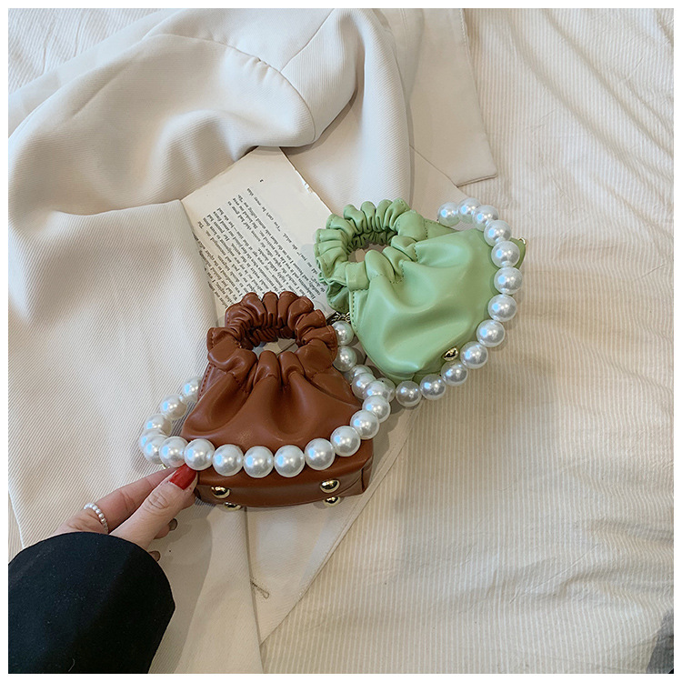 255g Weight Beading, Pearls Fashion Element Clasp Frame Closure Type Top Handle, Chain Strap Type Crossbody Bag Bags Type Casual, Daily, Shopping Occasion Pu Leather Material Solid Color Pattern All Seasons Season Kid'S Gender Cute Style Bucket Shape Kid'S Pu Leather Solid Color Cute Beading Pearls Bucket Clasp Frame Crossbody Bag 2