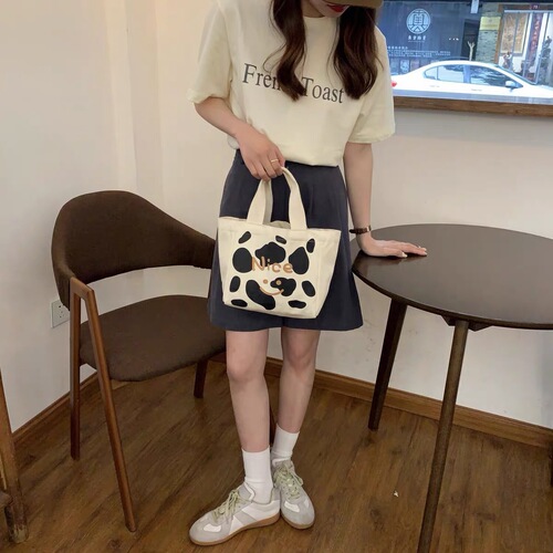 Japanese and Korean style lunch box, work bag, original cow pattern canvas bag, forest style small shoulder bag, lunch bag, ins high value