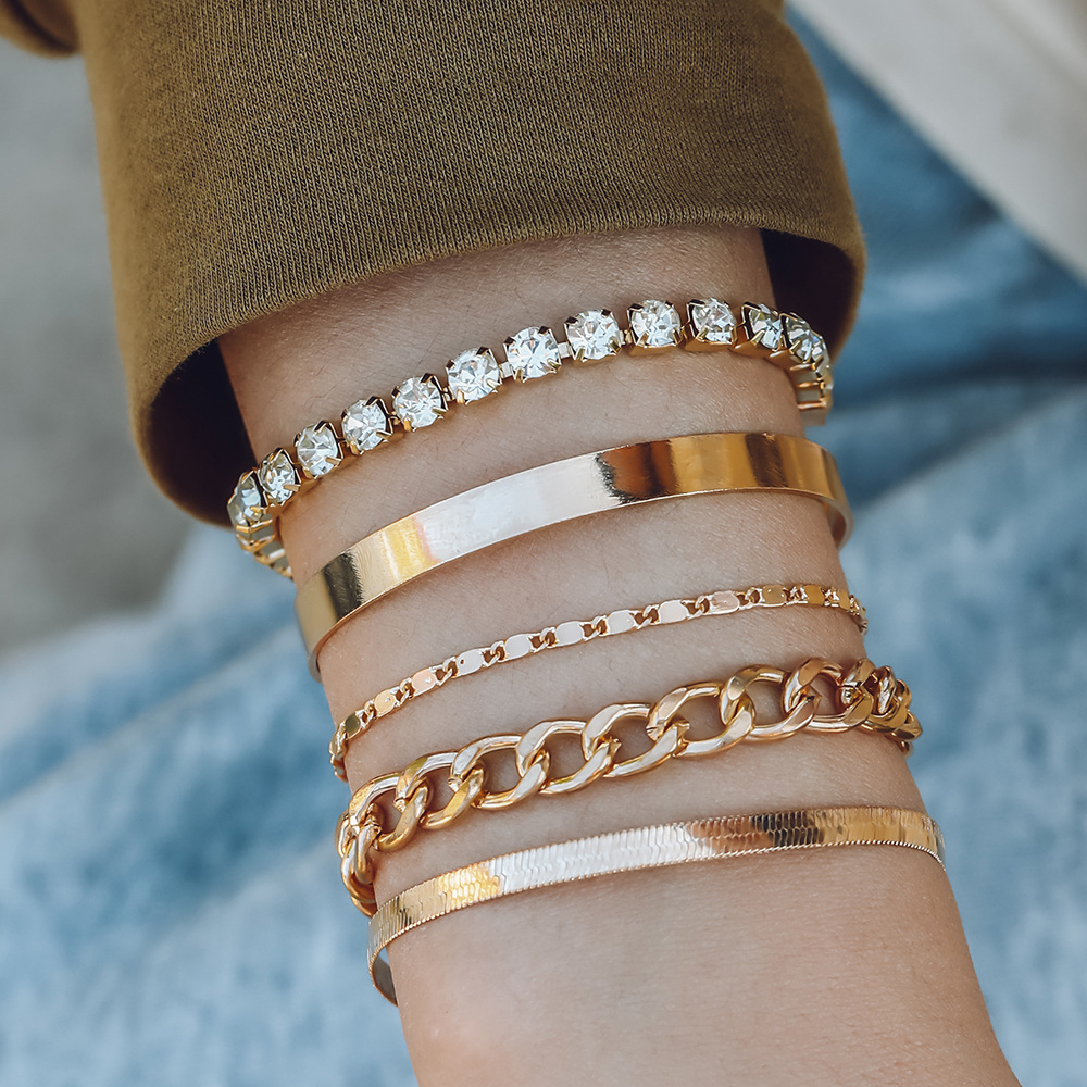 Pulsera de cadena de garra hecha a mano de cobre simple europeo y americano pulsera de traje de diamantes de imitación geométrica multi-elemento