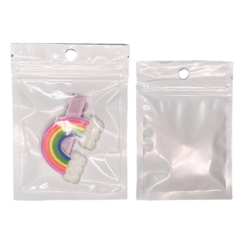 Película de perlas Yin y Yang bolsa autosellante translúcido película de perlas hueso tirando de la bolsa de teléfono móvil bolsa de embalaje de la cáscara equipo de pesca bolsa de sellado de plástico