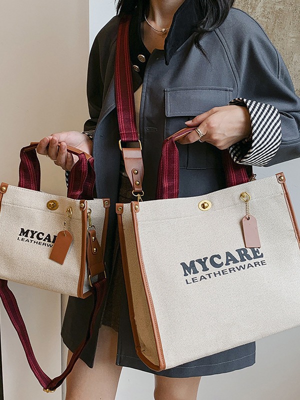 Gran capacidad de viaje al trabajo bolso de mano para mujeres 2024 nuevo lino retro color contraste mochila de hombro