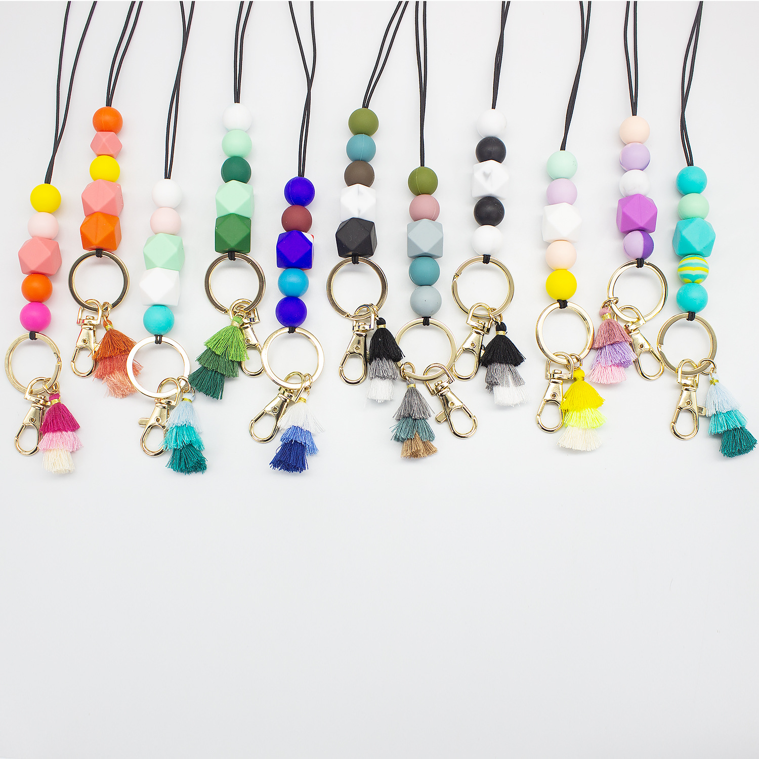 Cordón de cuentas de silicona de dibujos animados collar de goma suave Estudiante Adulto fiesta universal colgante borla cordón llavero