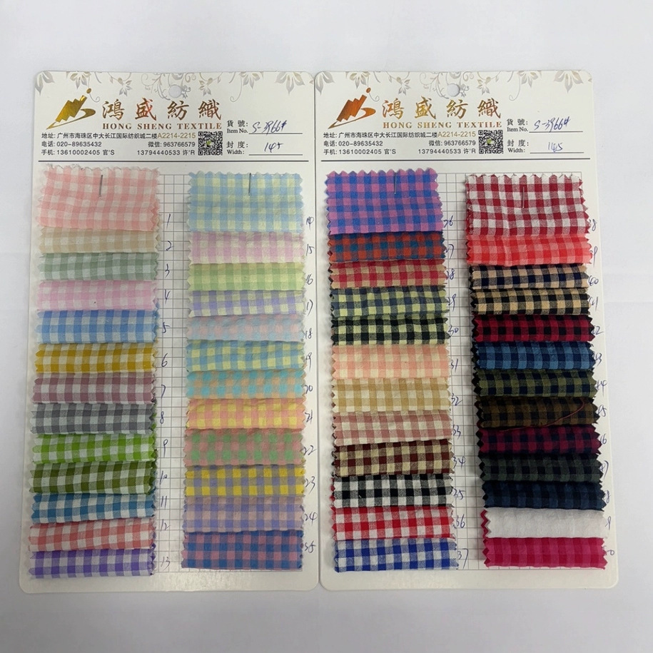新款涤棉泡泡格 色织格子布  斜纹格子衬衫面料 现货供应