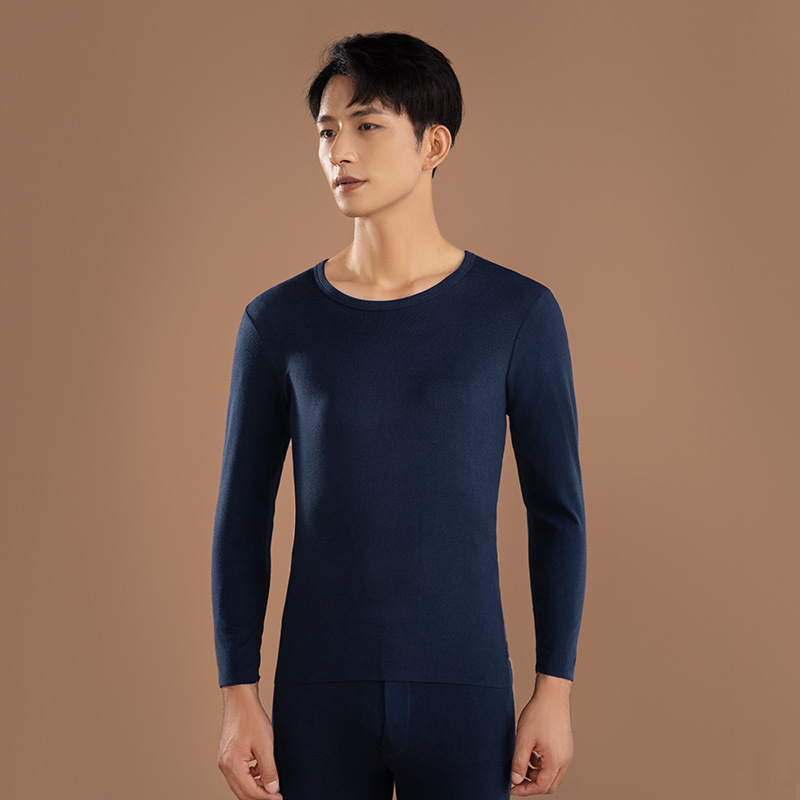 Ropa interior térmica de los hombres Calzoncillos largos finos de calefacción sin costuras traje de los hombres jóvenes de color sólido cuello redondo terciopelo Calzoncillos largos