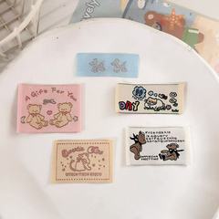 かわいい漫画の布のラベルの荷印の服装の装飾は箱の服の商標の荷印の手作りのdiyの部品を貼ります。