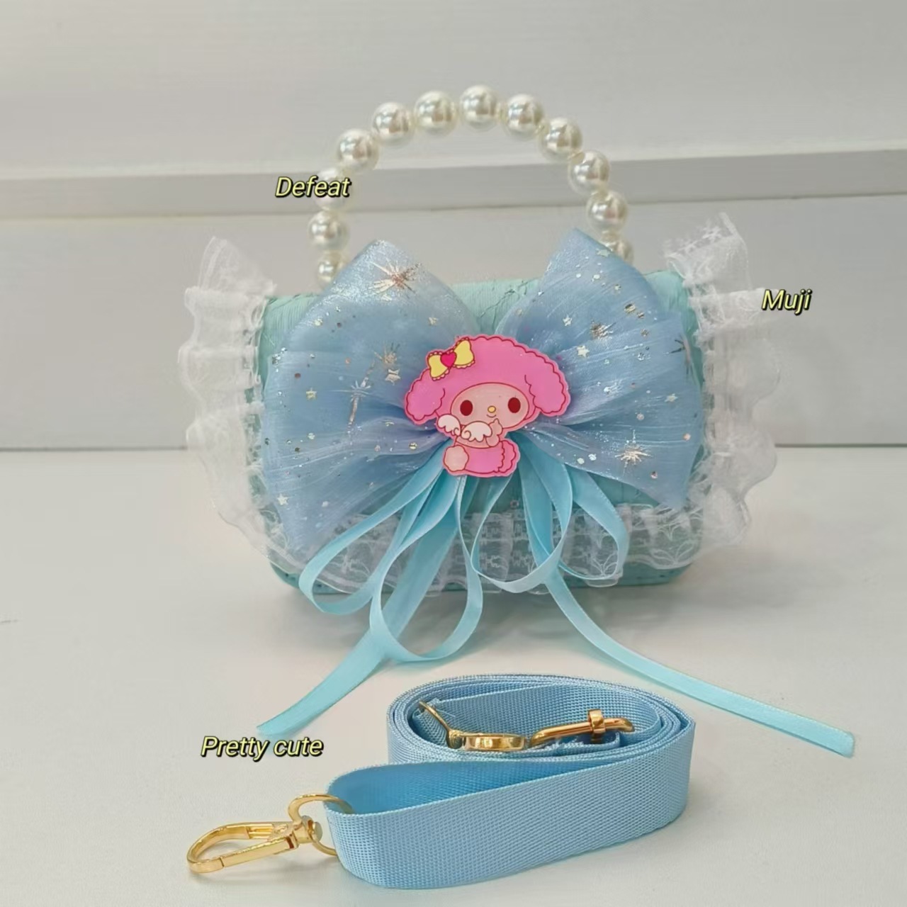 Bolso de arco para niños bolso de perlas bolso de hombro bolso de cambio bolso de accesorios bolso de dibujos animados Melody bolso de princesa