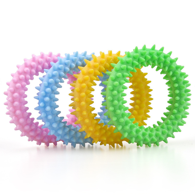 Fábrica transfronteriza nuevo juguete para mascotas TPR espuma Thorn anillo leche sabor pequeño espina anillo molar dientes limpieza perro juguete