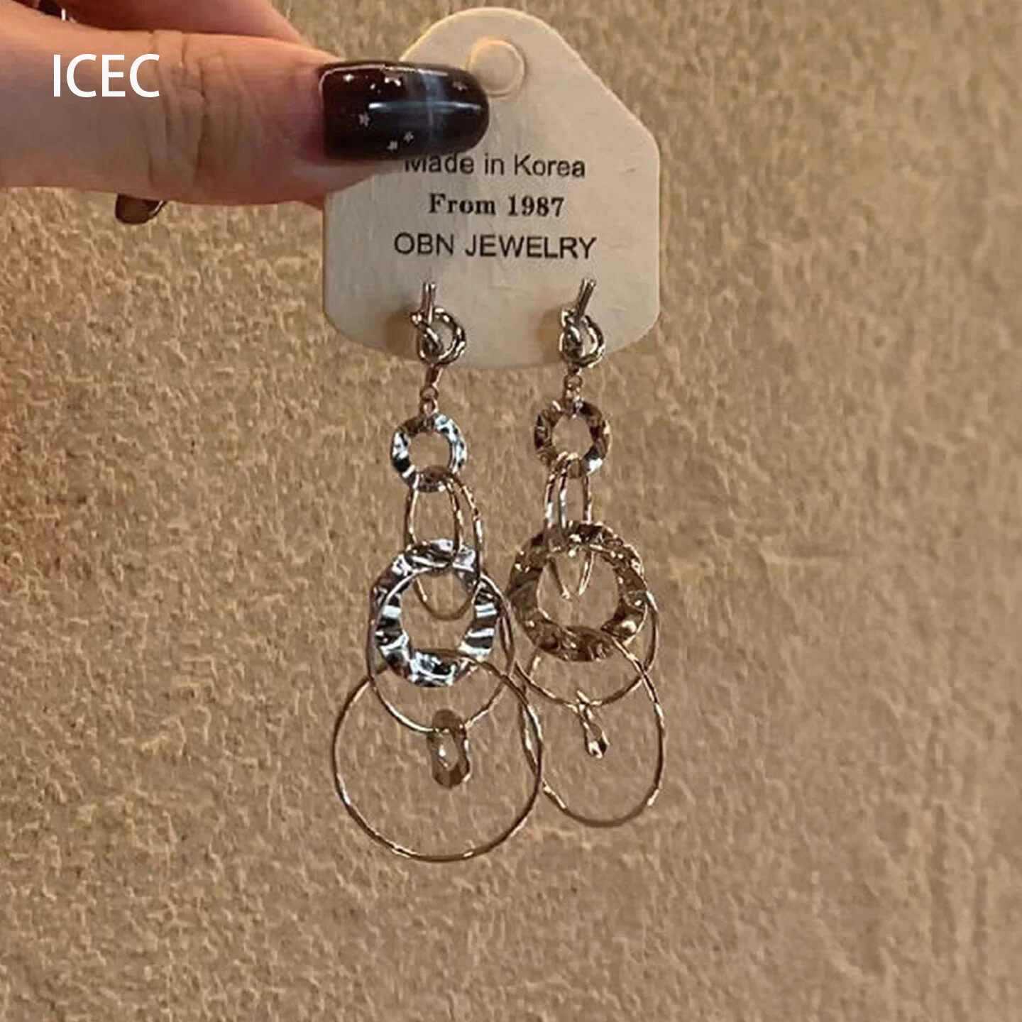 Silver circle geometric ear clips
