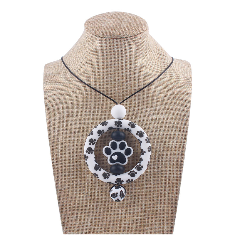 Suministros para bebés de dibujos animados perro garra collar creativo bebé cuentas de silicona mordedura molar COLLAR COLGANTE hecho a mano