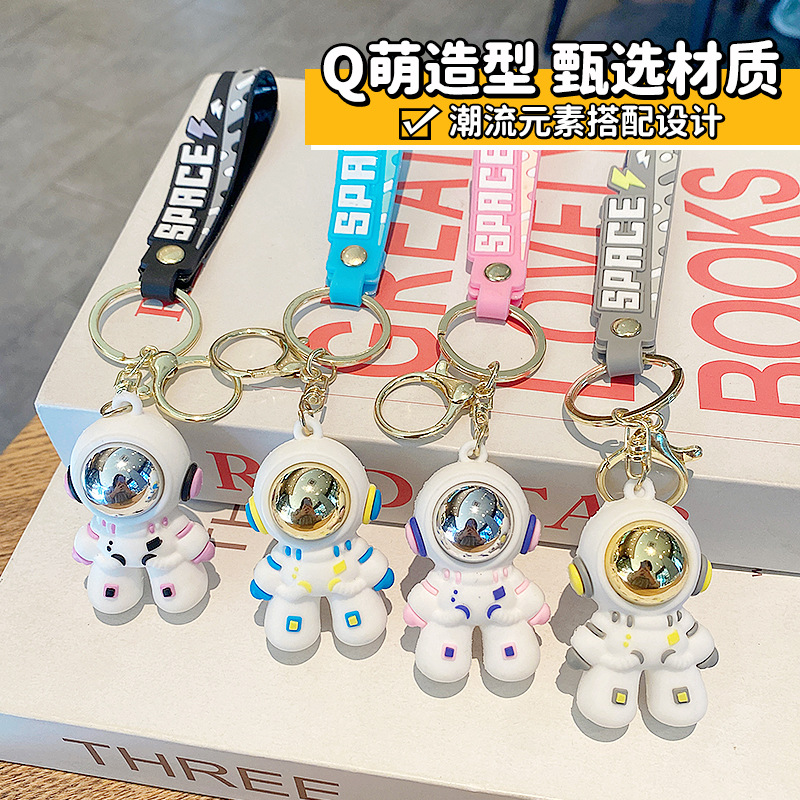 Dibujos animados cosmonauta astronauta astronauta muñeca llavero accesorios de automóvil creativos lindo bolso de pareja colgante regalo