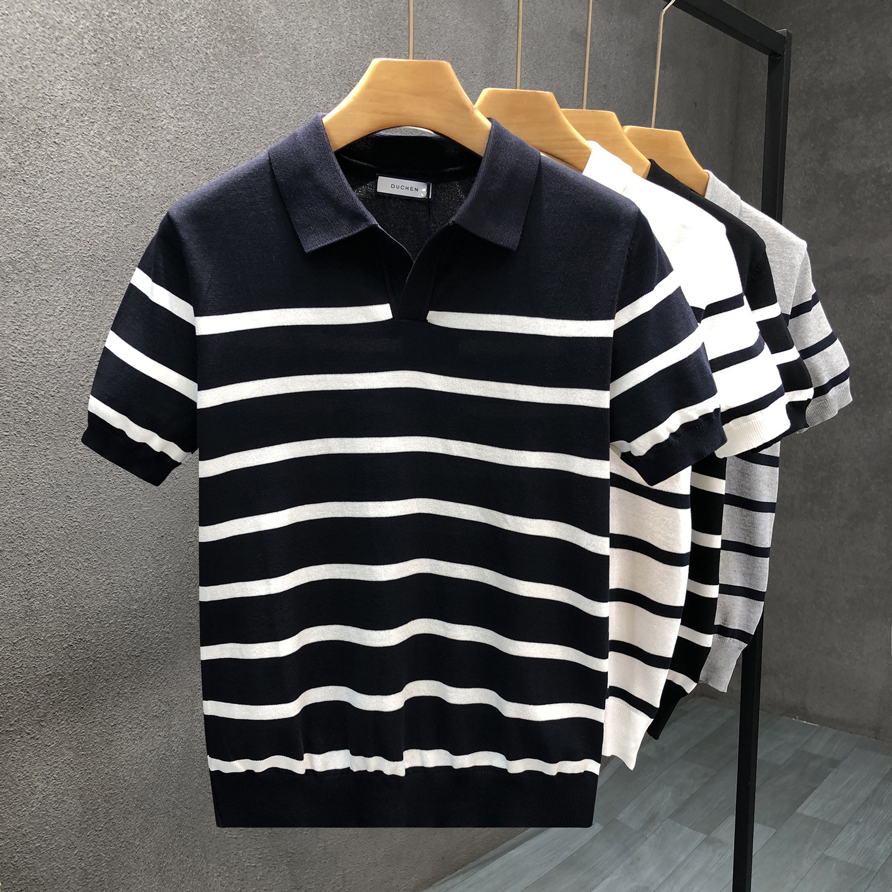 Polo camiseta de punto camiseta de manga corta camiseta de hombre cuello en V gaviota cuello rayas viejas líneas de viento de verano fábrica transfronteriza mayorista