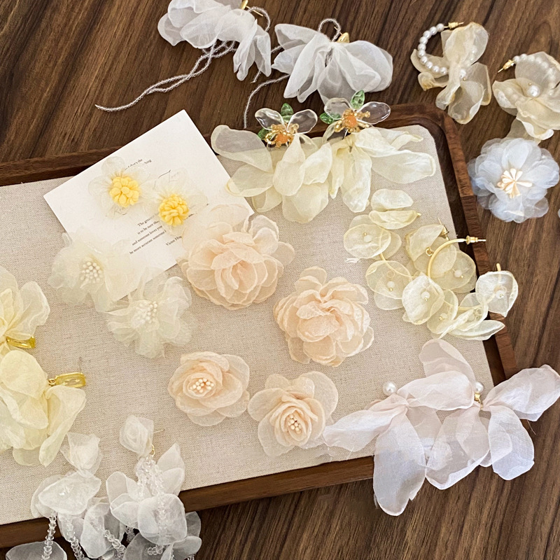 Pendientes de borla de flores de hilo de malla de tela de aguja de plata Pendientes dulces y frescos Pendientes de todo fósforo de moda Sensación de alto nivel de nicho