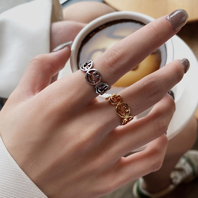 European and American new cute hollow smiley silver plated copper ring female