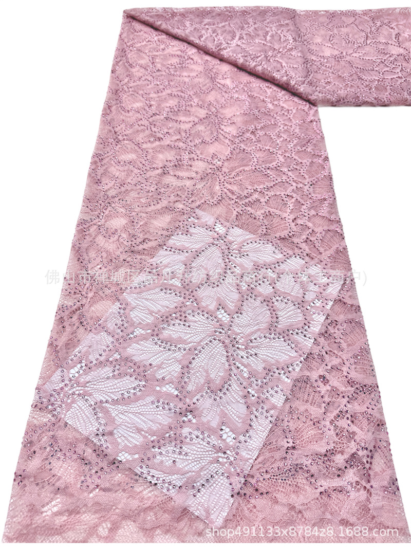 Nuevo hueco flor de encaje fondo tela de perforación caliente pesada cola de pez vestido de boda vestido de noche brindis tela spot